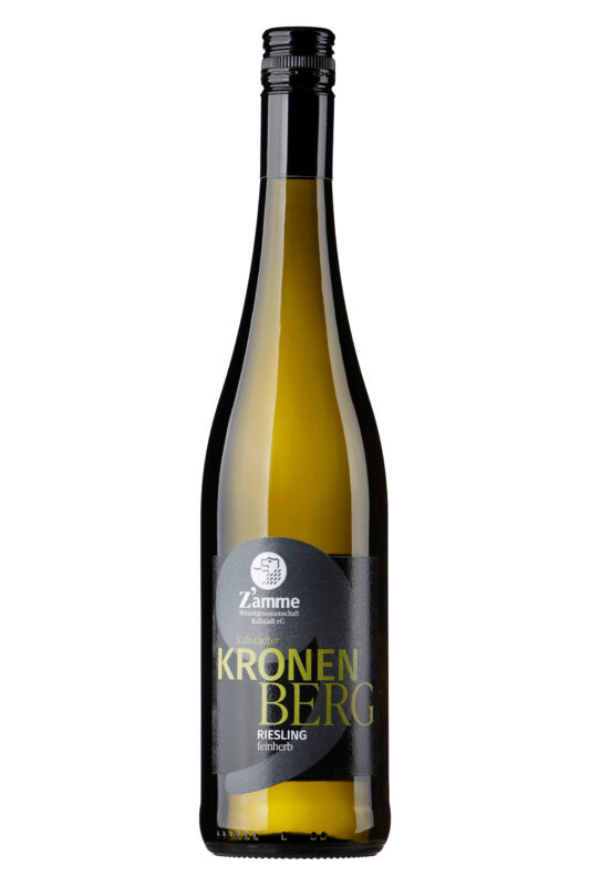 Tall wine bottle photographed from neck to base, label reads KRONEN BERG Riesling with golden wine visible inside.