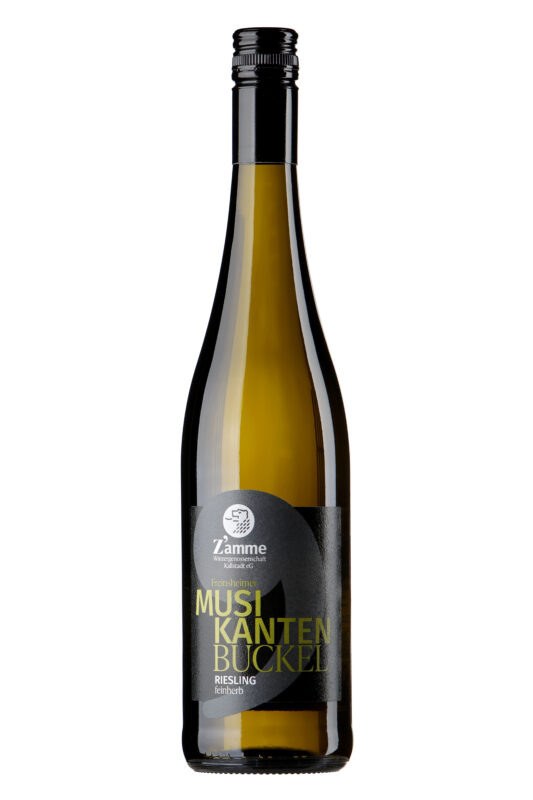 Tall wine bottle with dark label and gold text reading 'Musikanten Buckel' Riesling, corked top visible